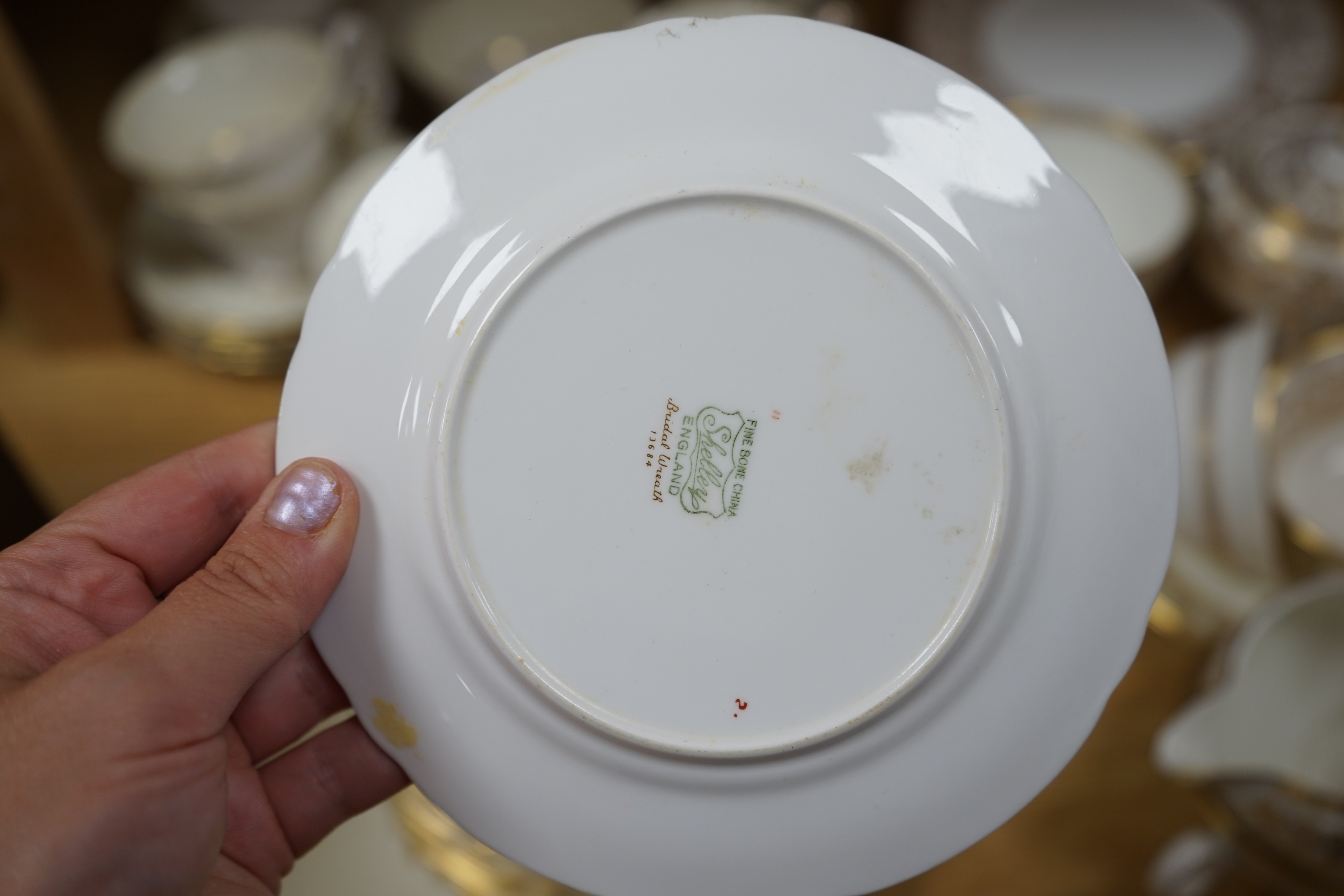 A Wedgwood Gold Florentine part teaset and Shelley Bridal Wreath